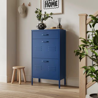 The Shoreditch shoe cabinet in navy blue with a top drawer, two lower shoe compartments and matching handles, styled in a hallway.